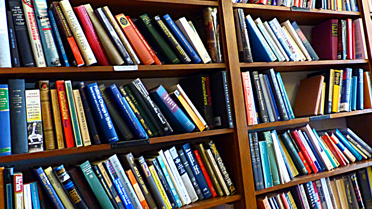 Closeup of library bookshelves filled with books